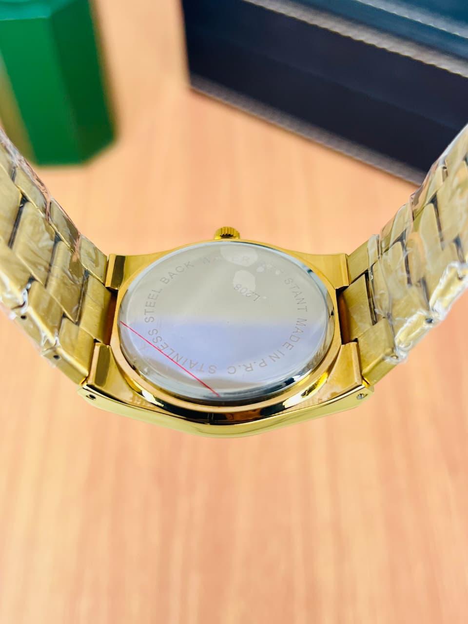 Tissot Prx 1853 gold with white dail